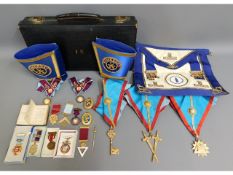 A quantity of Masonic regalia including silver med