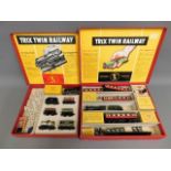 Two boxed Trix twin railway sets
