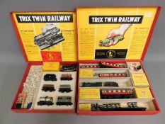 Two boxed Trix twin railway sets