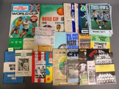 A quantity of football programmes & related items
