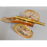 A brass model desk canon, 18.5in long