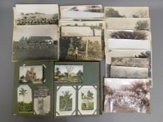 A quantity of military interest postcards in album