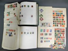 Two partially filled world albums & loose pages including Palestine, Iraq, India, Jamaica, Switzerla