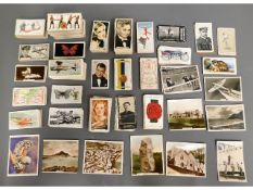 A quantity of cigarette cards including Ogdens, St