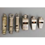 Six vintage whistles including Eden & Co. Acme Thu