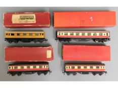 Four boxed Trix railway carriages, three Bogie Coa