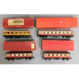 Four boxed Trix railway carriages, three Bogie Coa