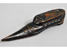 A 19thC. ebonised treen snuff box shoe