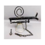 A 19thC. ships bell system with iron mounts, bell