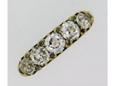 A 19thC. 18ct gold, rubbed mark, carved half hoop