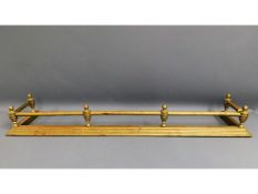 A brass fire fender, 53in x 11in deep