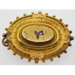 A Victorian yellow metal mourning brooch, a/f, set