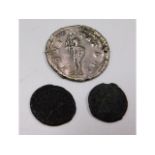 A Roman silver coin & two others in bronze