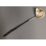 An 18/19thC. baleen & white metal toddy, tests as