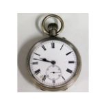A base metal antique top wind pocket watch, runs w