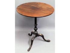 A 19thC. mahogany tilt top table, 27.75in high x 2