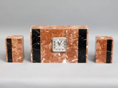 An art deco marble clock with garnitures, main clo