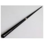 An ebonised military swagger stick stamped NDV wit