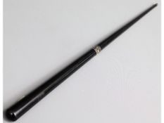 An ebonised military swagger stick stamped NDV wit