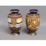 A matching pair of Japanese vases, shown with rear