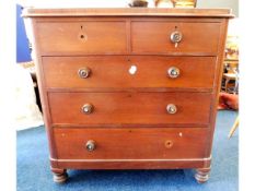 A Victorian bow fronted mahogany veneered chest of