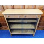 A mid 20thC. retro oak book case with two drawers