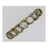 An 18ct yellow gold half eternity ring set with ap