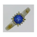 A 18ct white gold ring set with tanzanite & diamon