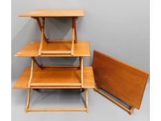 Four Myers teak folding tables, largest 33.25in wi