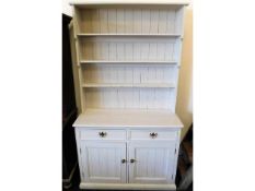 An antique pine dresser, later painted, 43.5in wid