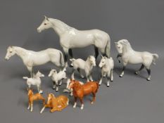 A quantity of Beswick horses, one mare loss to ear