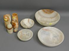 Four onyx bowls & other onyx wares, largest bowl 1