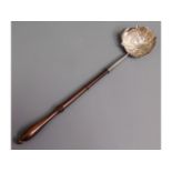 A 19thC. baleen & white metal toddy, tests as silv
