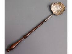 A 19thC. baleen & white metal toddy, tests as silv