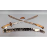 A Tibetan double sword & scabbard a/f, 39in long