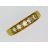 An 18ct gold five stone diamond ring of 0.32ct, 2.