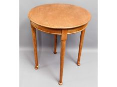 An antique mahogany table, 29in high x 24in diamet