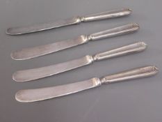 Four silver handled cake knives