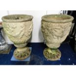 A pair of large two piece pedestal reconstituted s
