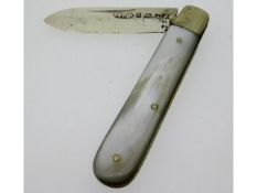 A 1909 Birmingham silver mother of pearl handled f