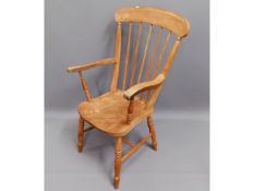 A 19thC. elm seated antique Windsor style chair, 4