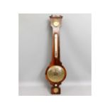 A Regency period rosewood barometer by J. Wilson,