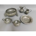 A pewter footed bowl twinned with other pewter war