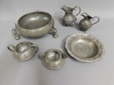 A pewter footed bowl twinned with other pewter war