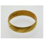 A 9ct gold band, 2.3g, size W