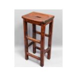A vintage stained oak bar stool, 30.5in high x 14.