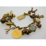 An 18ct gold charm bracelet set with 16 charms, ni