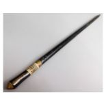 An Indian sword stick with twist lock brass feral
