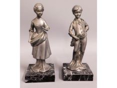 Two marble mounted spelter figures, 7in tall