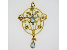 An Edwardian 15ct gold pendant/brooch set with nat